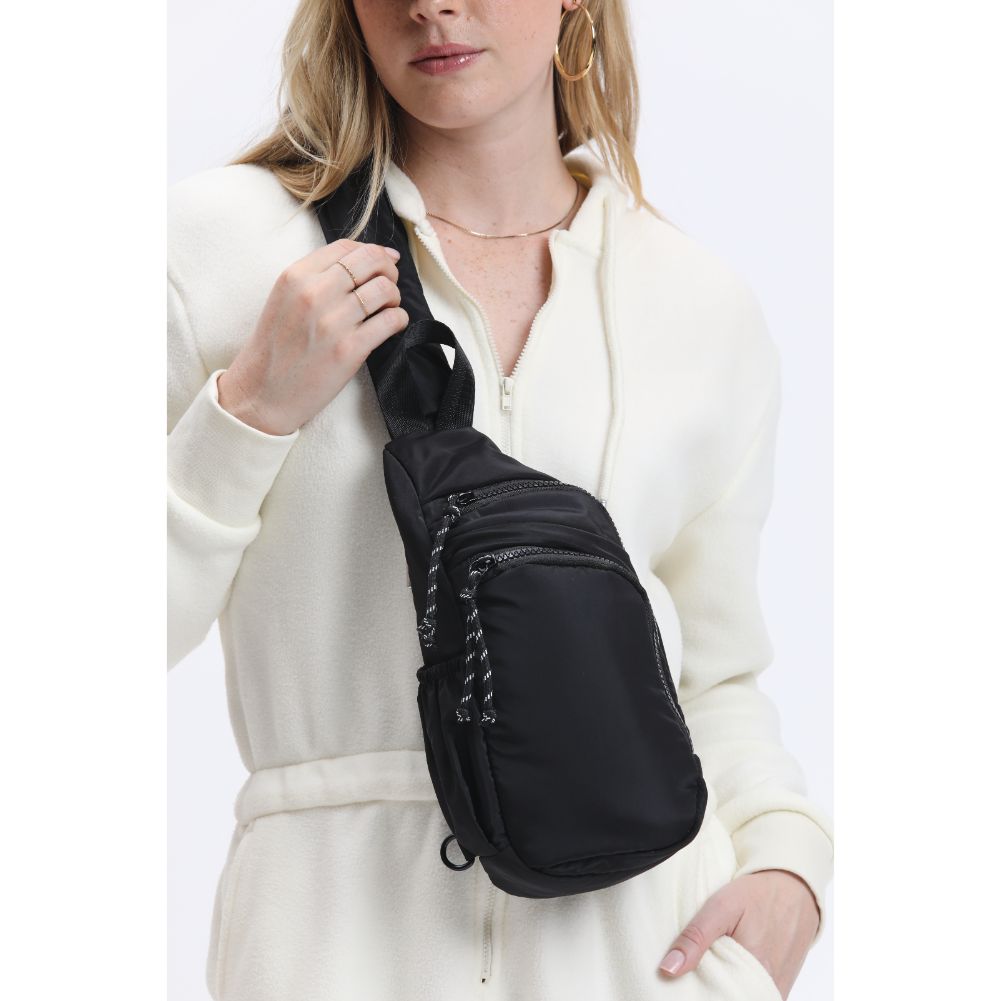 Woman wearing Black Urban Expressions Parc Sling Backpack 840611114419 View 4 | Black