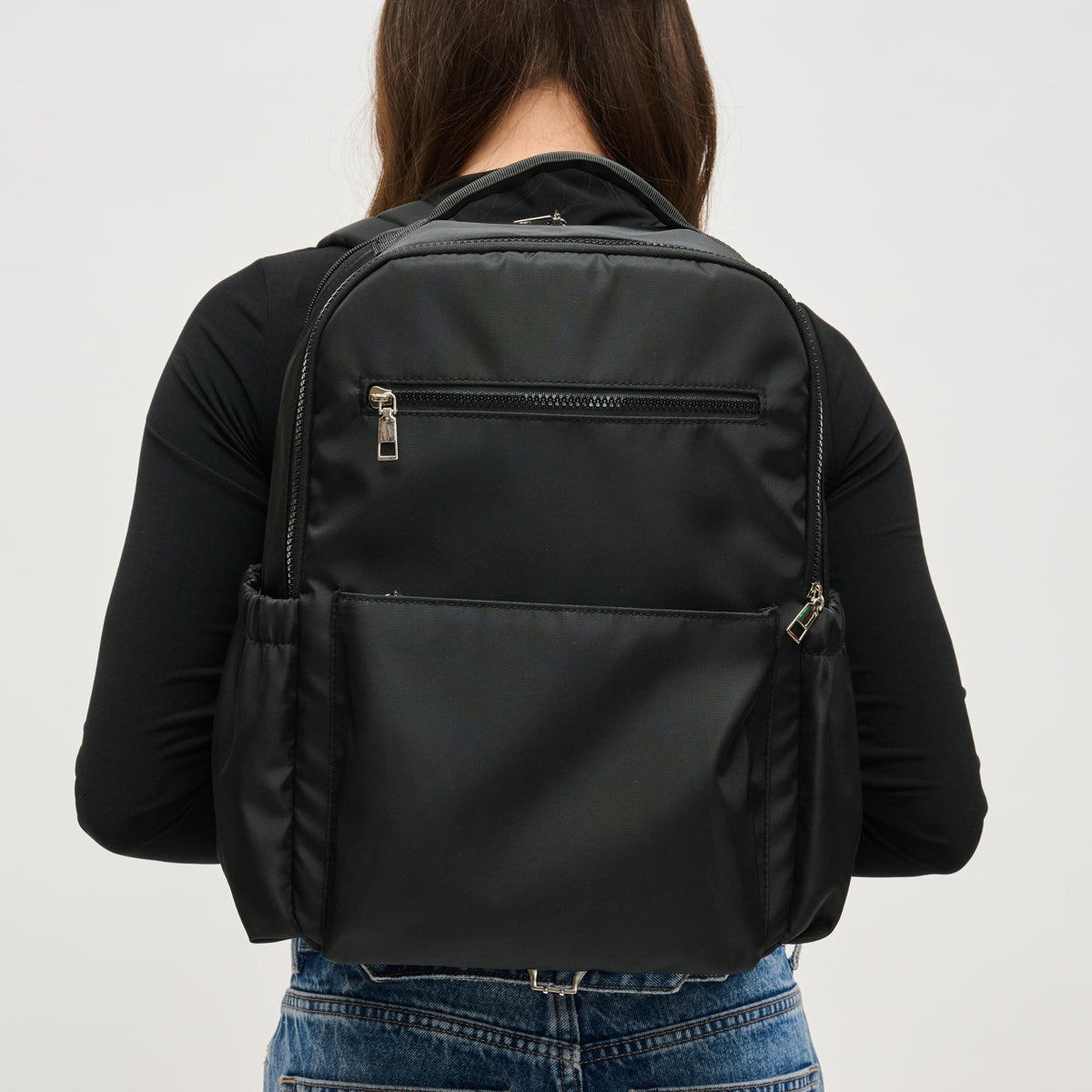 Woman wearing Black Urban Expressions Urban Explorer Backpack 840611195357 View 1 | Black