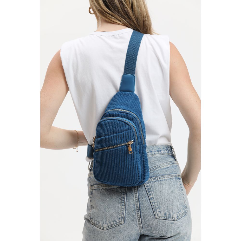 Woman wearing Sapphire Urban Expressions Zephyr - Corduroy Sling Backpack 840611116512 View 2 | Sapphire