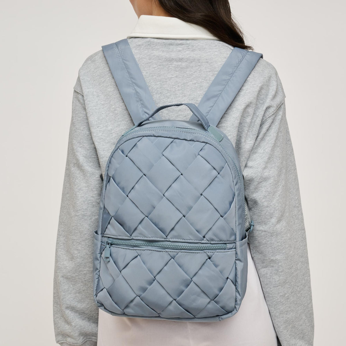 Woman wearing Dusty Blue Urban Expressions Robin Backpack 840611146472 View 2 | Dusty Blue