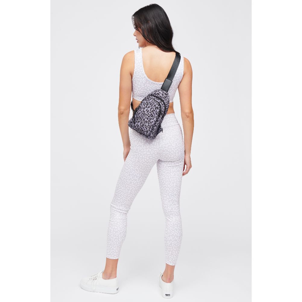 Woman wearing Grey Leopard Urban Expressions Ace Sling Backpack 840611184214 View 4 | Grey Leopard