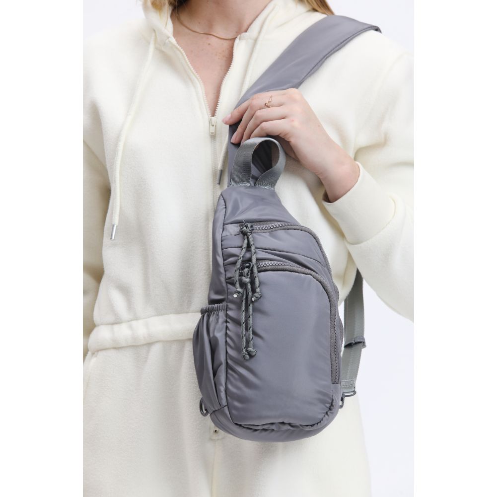 Woman wearing Grey Urban Expressions Parc Sling Backpack 840611114433 View 4 | Grey