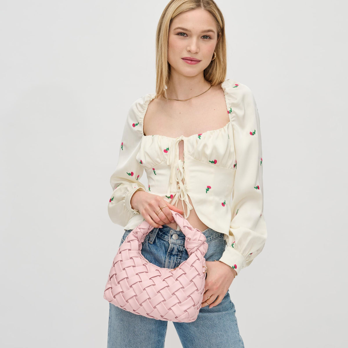 Woman wearing Rose Urban Expressions Josie Crossbody 840611126436 View 1 | Rose