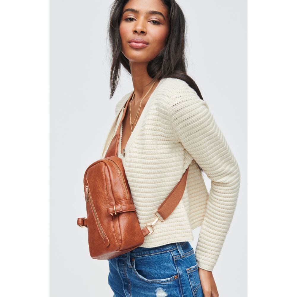 Woman wearing Tan Urban Expressions Micah Sling Backpack 840611108814 View 2 | Tan