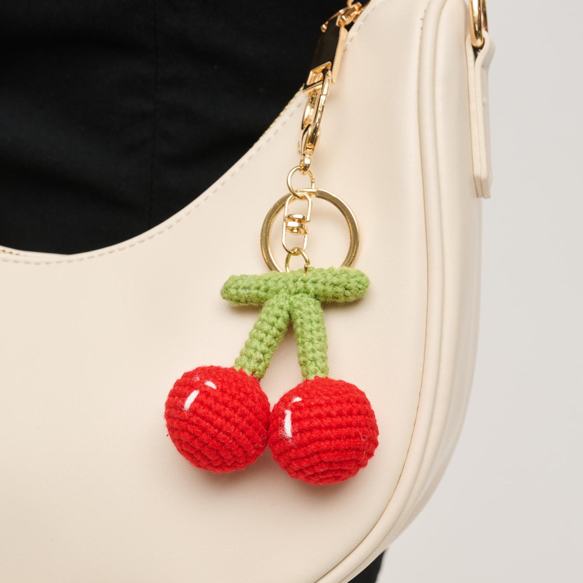 Woman wearing Cherry Urban Expressions Cherrylicious Keychain Charm 840611150615 View 1 | Cherry