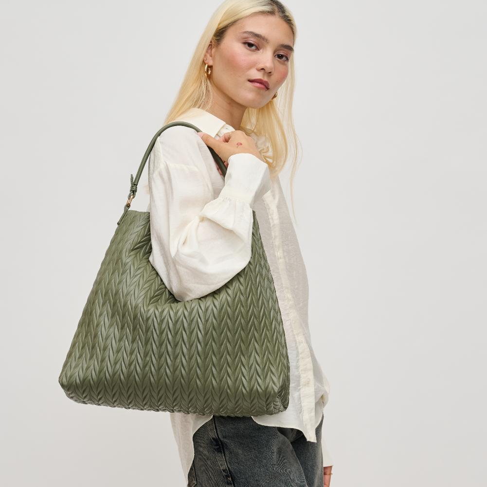 Woman wearing Sage Urban Expressions Harley Hobo 840611194435 View 1 | Sage