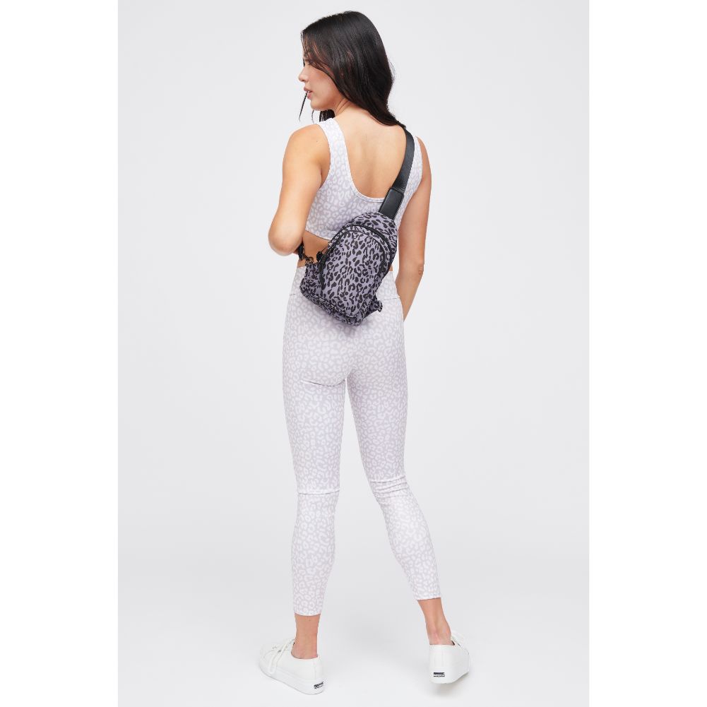 Woman wearing Grey Leopard Urban Expressions Ace Sling Backpack 840611184214 View 3 | Grey Leopard