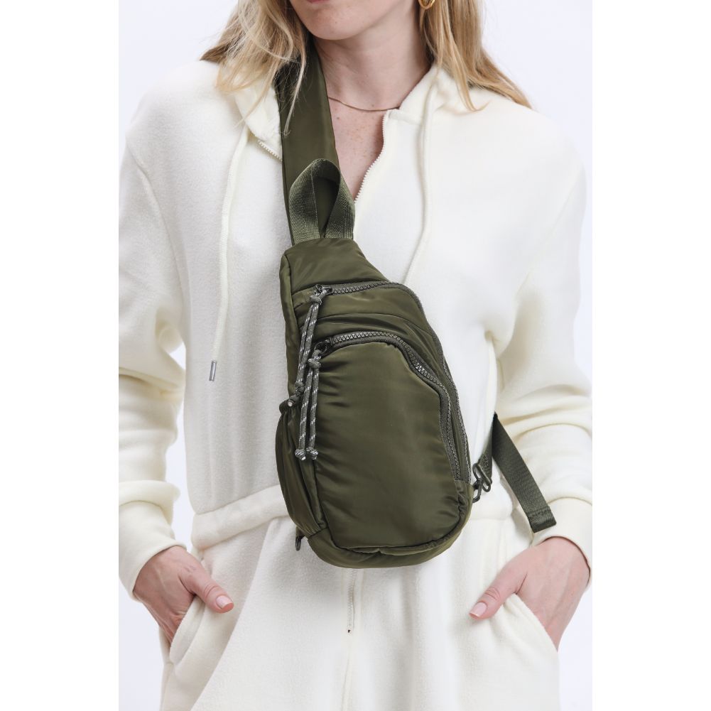 Woman wearing Olive Urban Expressions Parc Sling Backpack 840611114440 View 4 | Olive