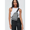 Woman wearing Houndstooth Urban Expressions Ace - Houndstooth Sling Backpack 840611104564 View 1 | Houndstooth