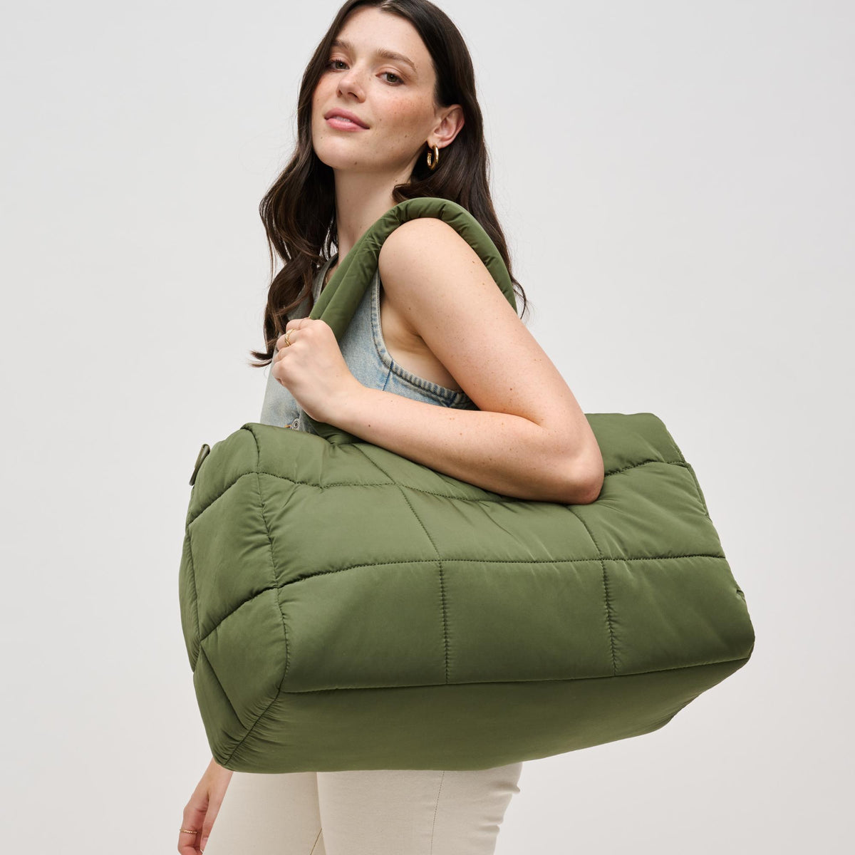 Woman wearing Olive Urban Expressions Freyja Duffel 840611124289 View 2 | Olive