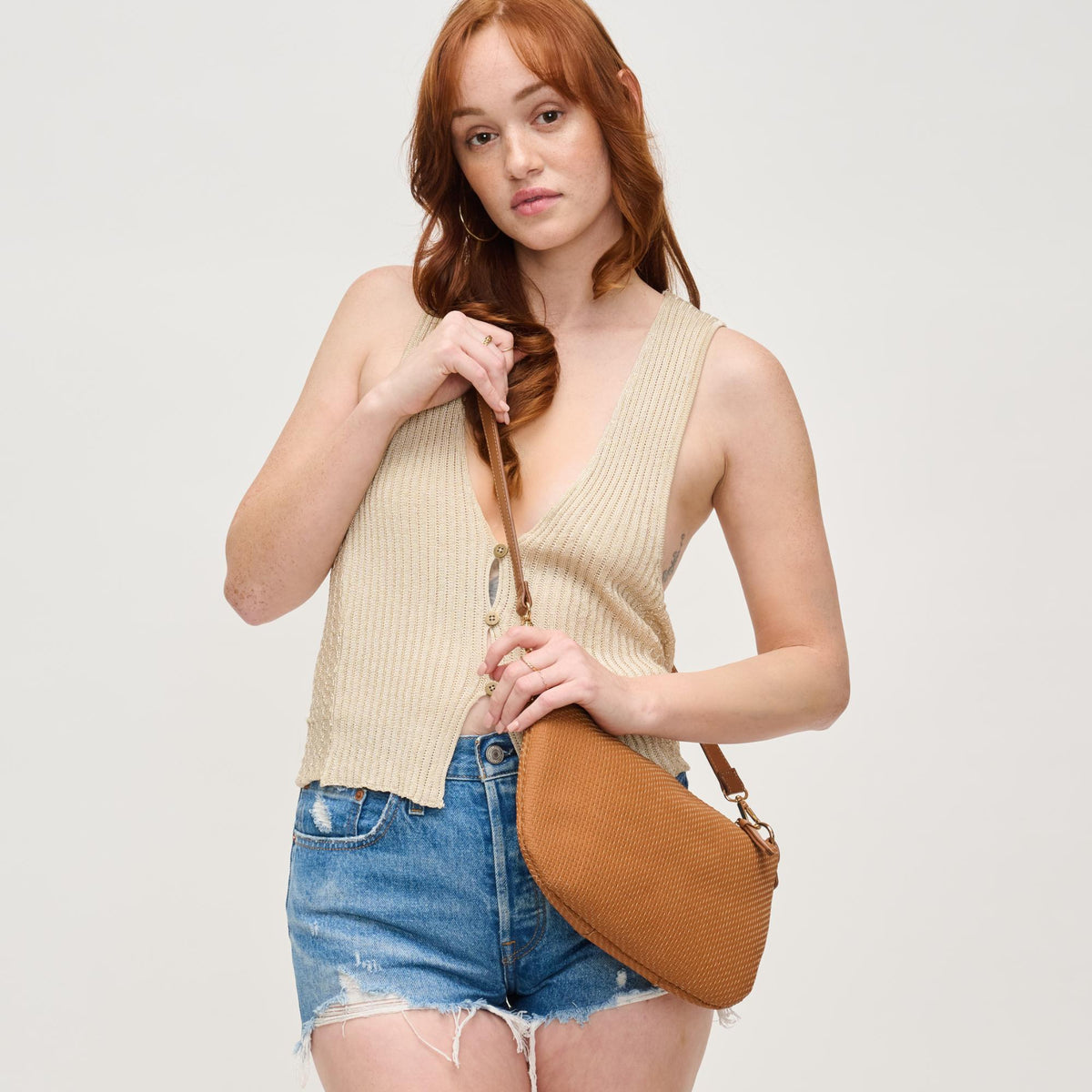 Woman wearing Tan Urban Expressions Jordan Crossbody 840611160409 View 2 | Tan