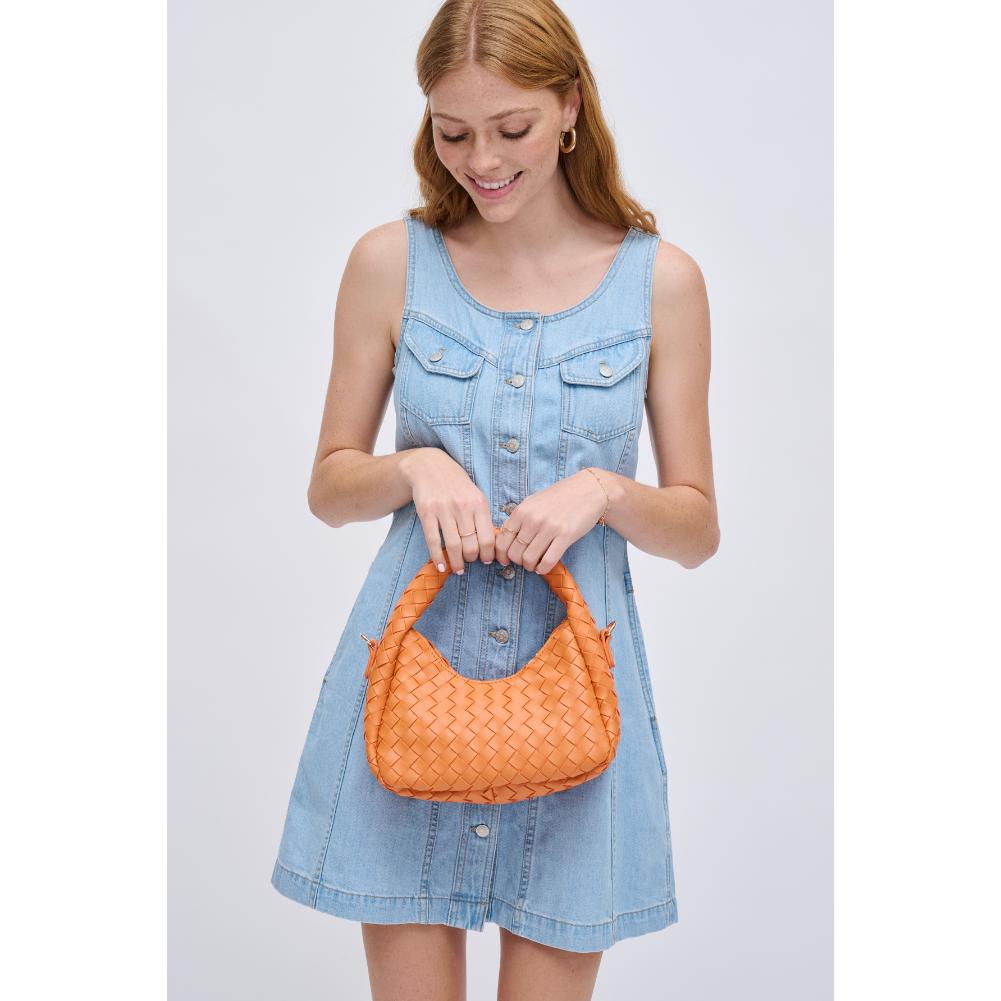 Woman wearing Tangerine Urban Expressions Orie Crossbody 840611123312 View 1 | Tangerine