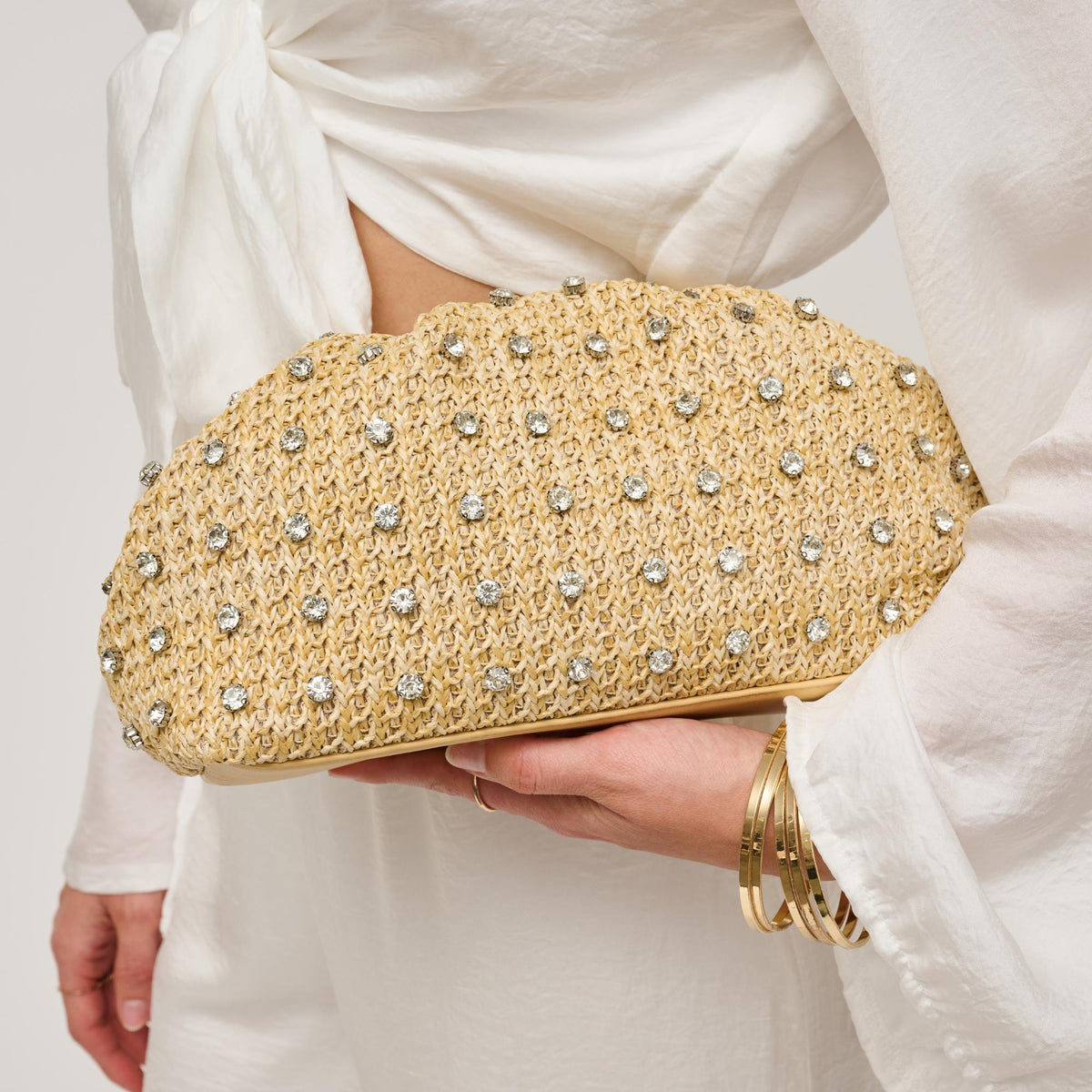 Woman wearing Natural Urban Expressions Mika Clutch 840611146830 View 4 | Natural