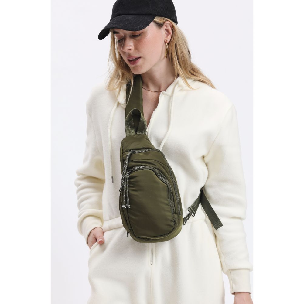 Woman wearing Olive Urban Expressions Parc Sling Backpack 840611114440 View 2 | Olive