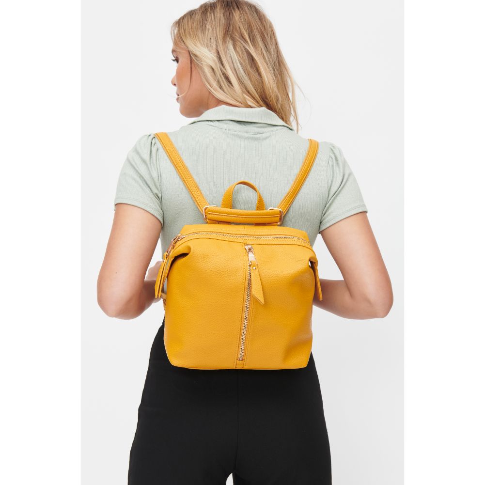 Woman wearing Mustard Urban Expressions Petit - Kenzie Backpack 840611101198 View 1 | Mustard