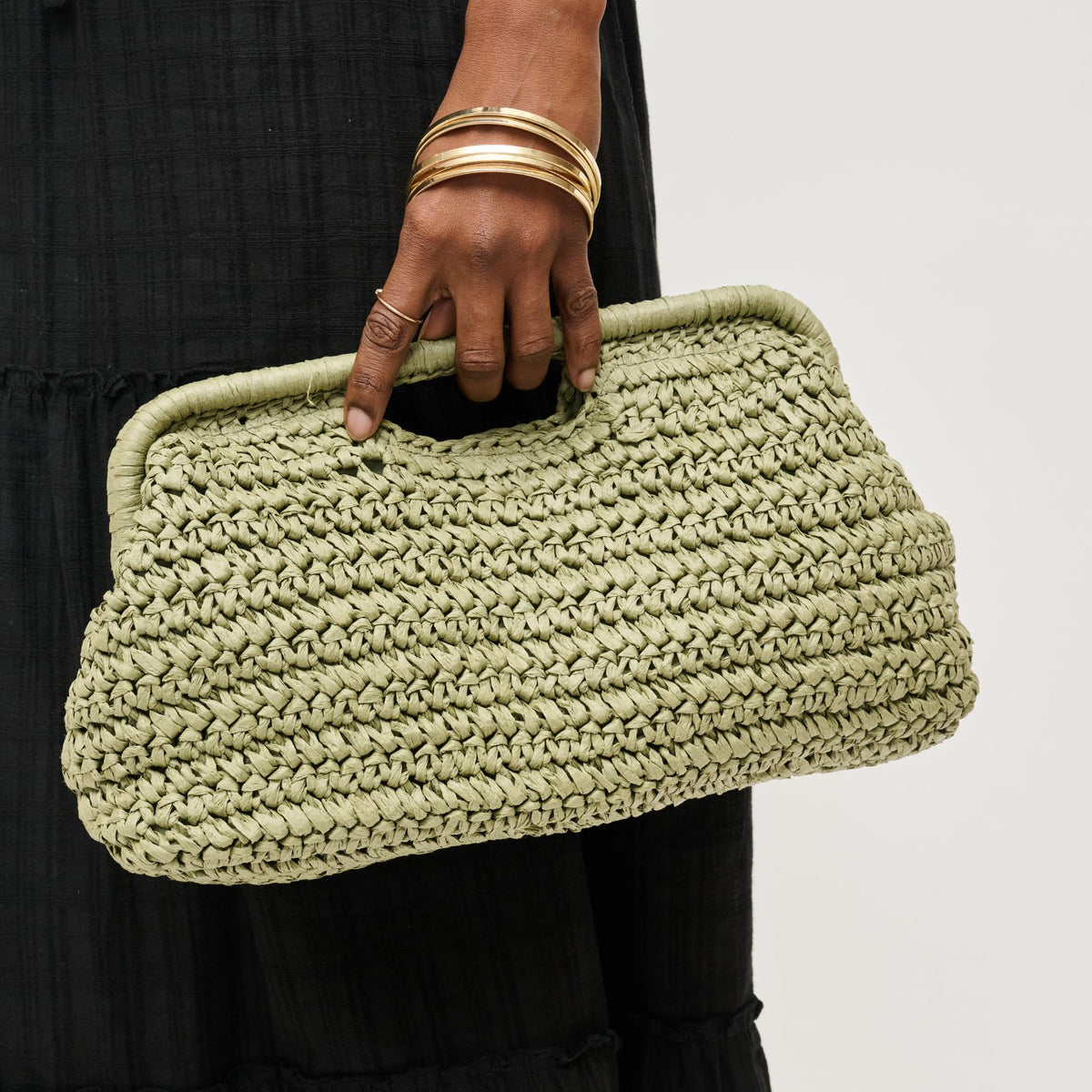 Woman wearing Sage Urban Expressions Lani Clutch 840611151636 View 1 | Sage