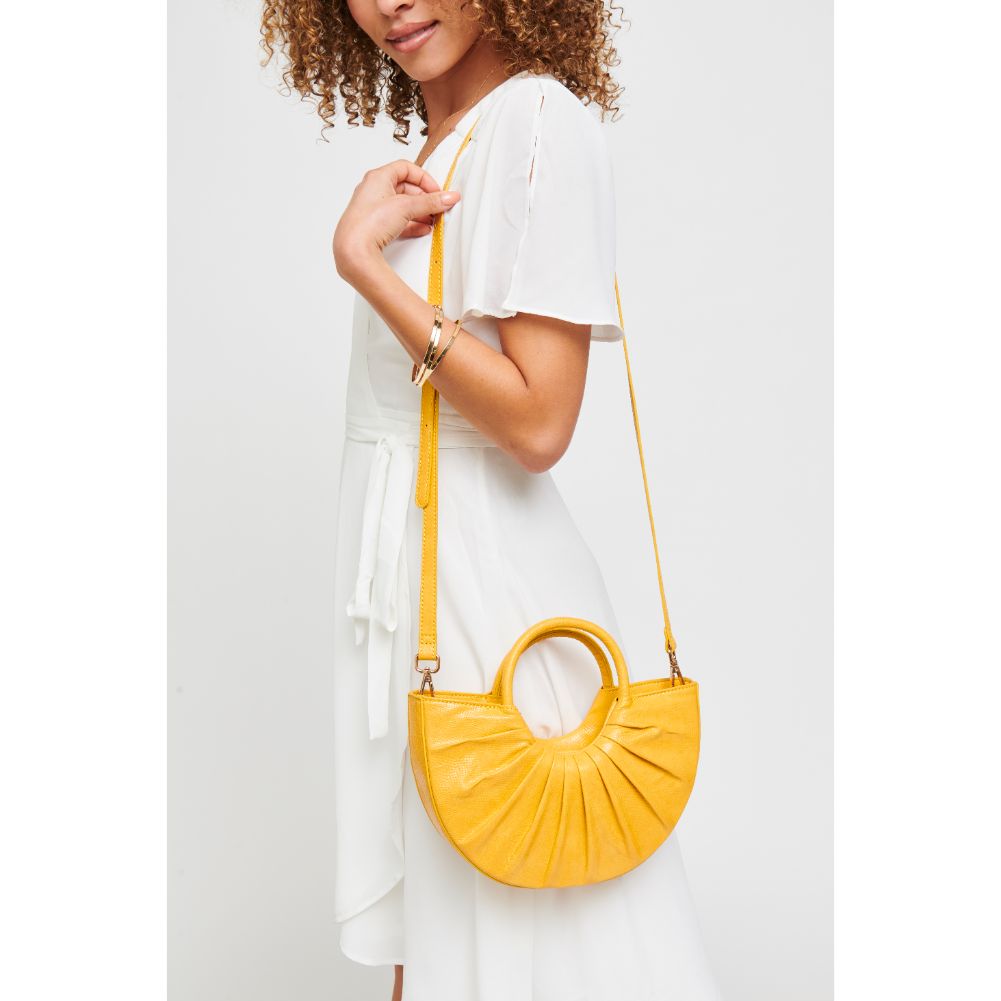 Woman wearing Sunshine Urban Expressions Star Crossbody 840611179531 View 1 | Sunshine