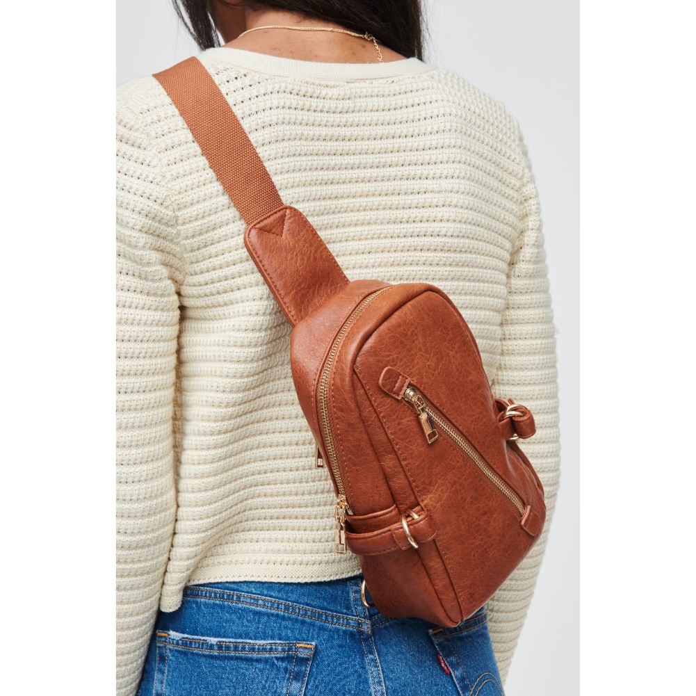 Woman wearing Tan Urban Expressions Micah Sling Backpack 840611108814 View 3 | Tan