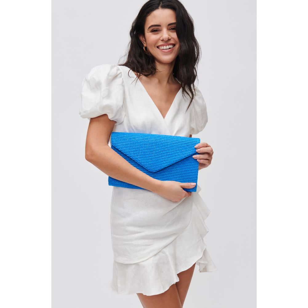 Woman wearing Ocean Urban Expressions Trista Clutch 840611108289 View 1 | Ocean