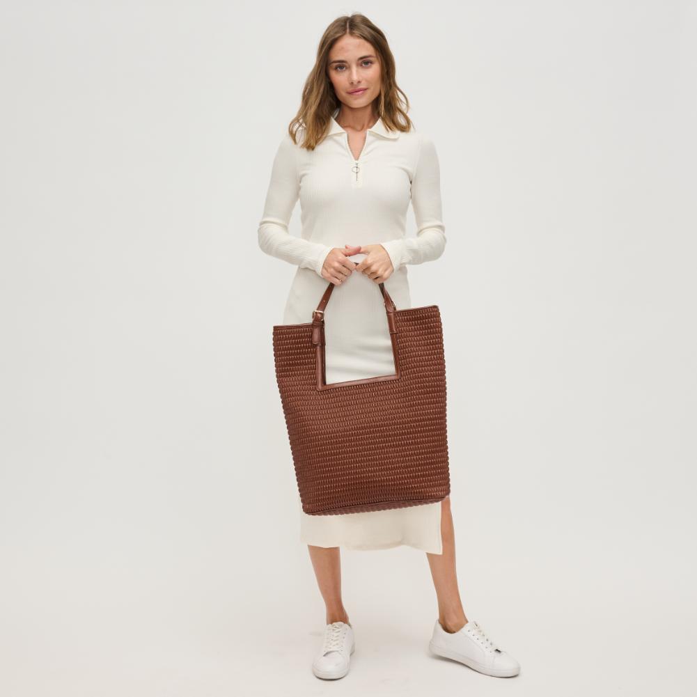 Woman wearing Chocolate Urban Expressions Aiden Tote 840611193612 View 2 | Chocolate