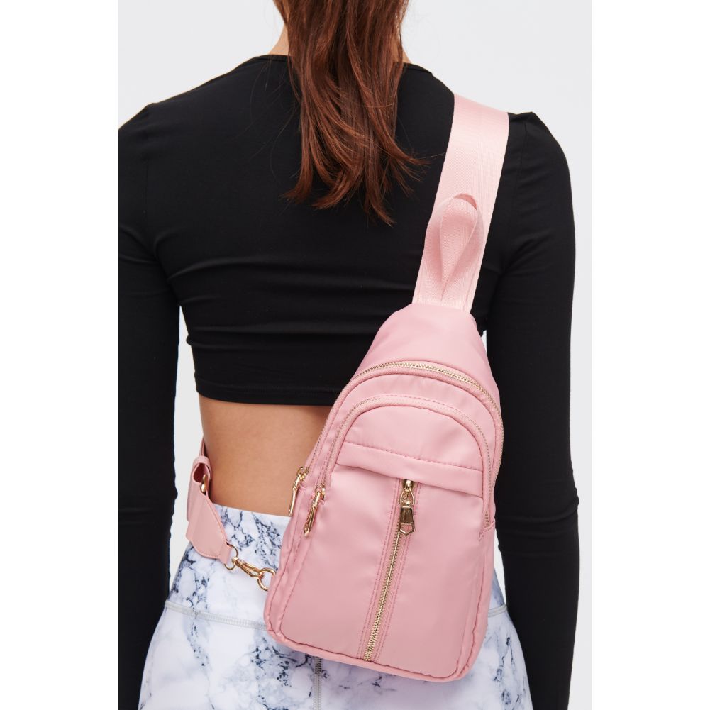 Woman wearing Blush Urban Expressions Wagner Sling Backpack 840611108357 View 4 | Blush