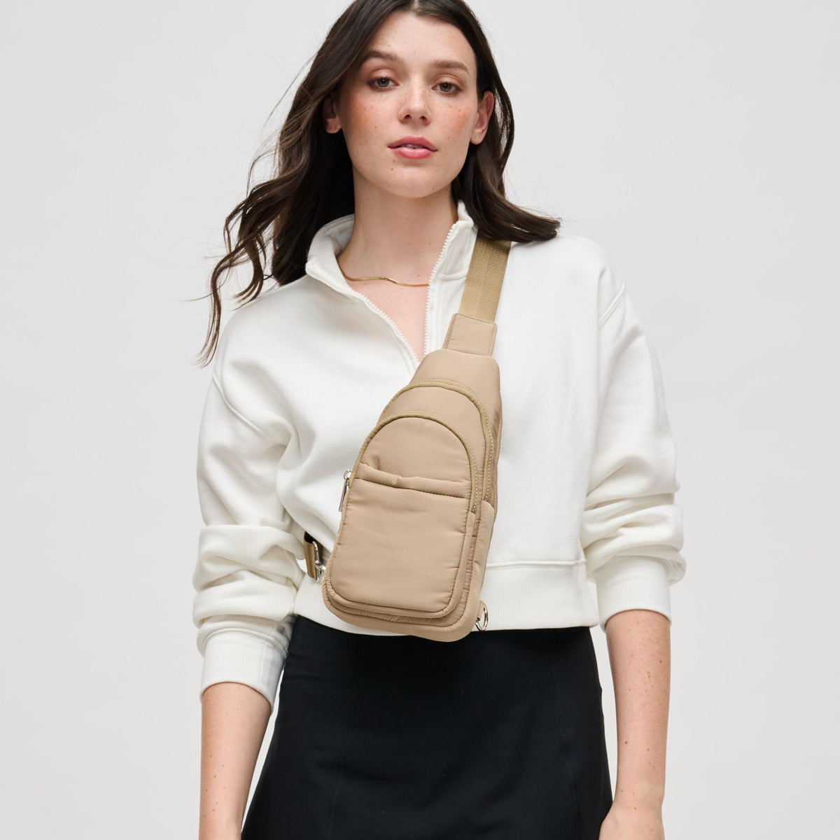 Woman wearing Natural Urban Expressions Kenny Sling Backpack 840611124975 View 1 | Natural