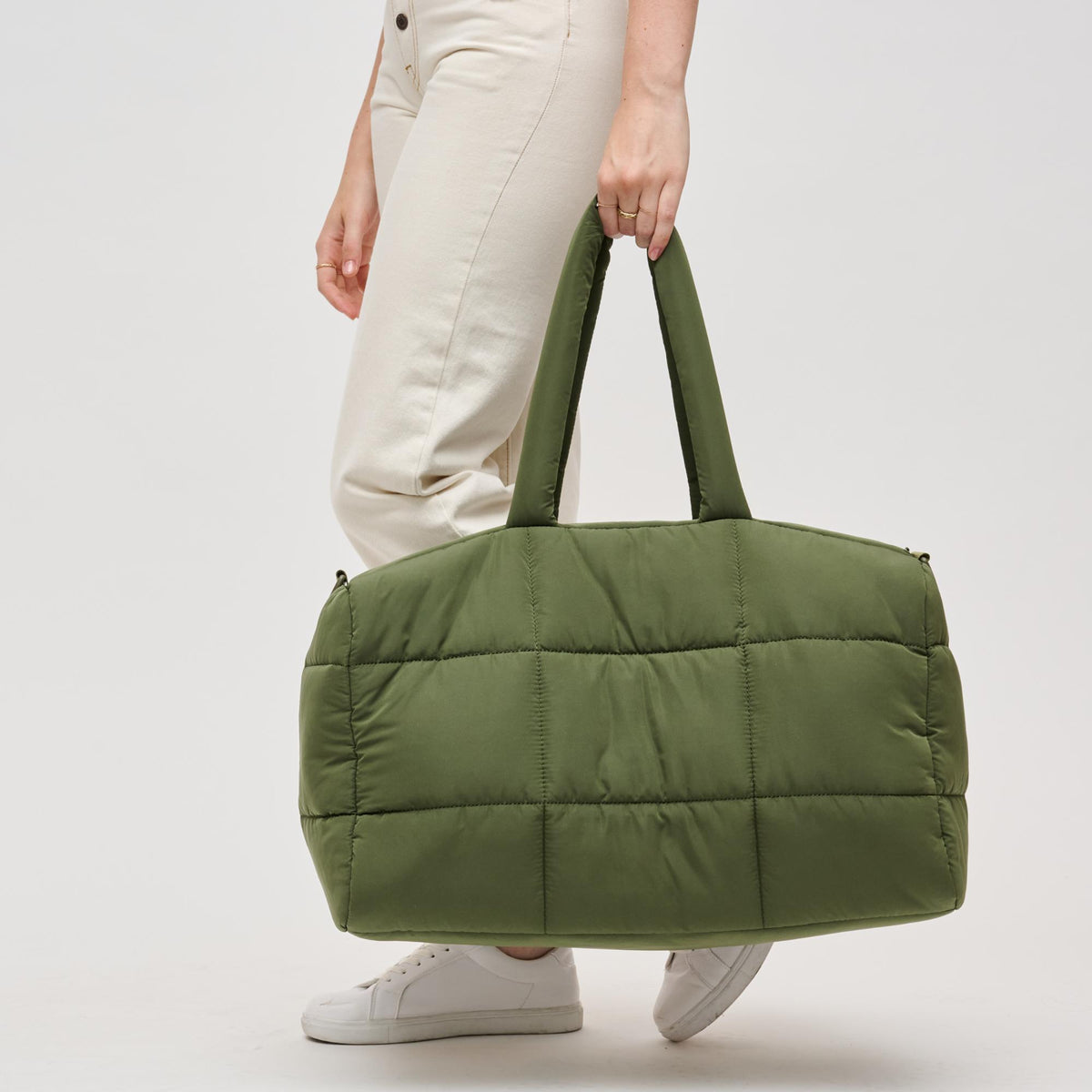 Woman wearing Olive Urban Expressions Freyja Duffel 840611124289 View 1 | Olive