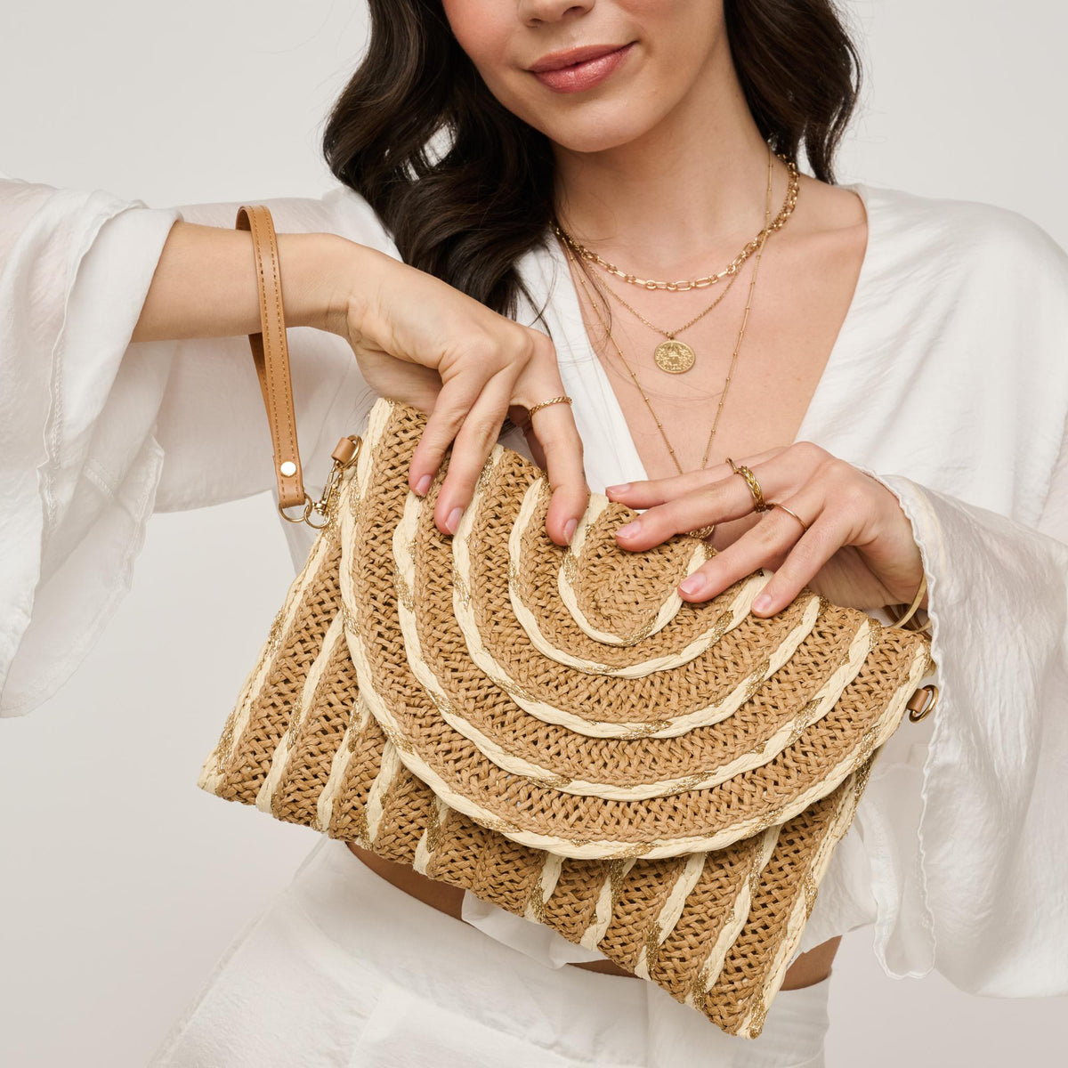 Woman wearing Natural Ivory Gold Urban Expressions Lila Clutch 840611161512 View 1 | Natural Ivory Gold