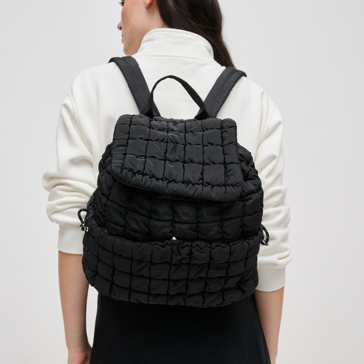 Woman wearing Black Urban Expressions Allston - Quilted Nylon Puffer Backpack 840611140302 View 1 | Black