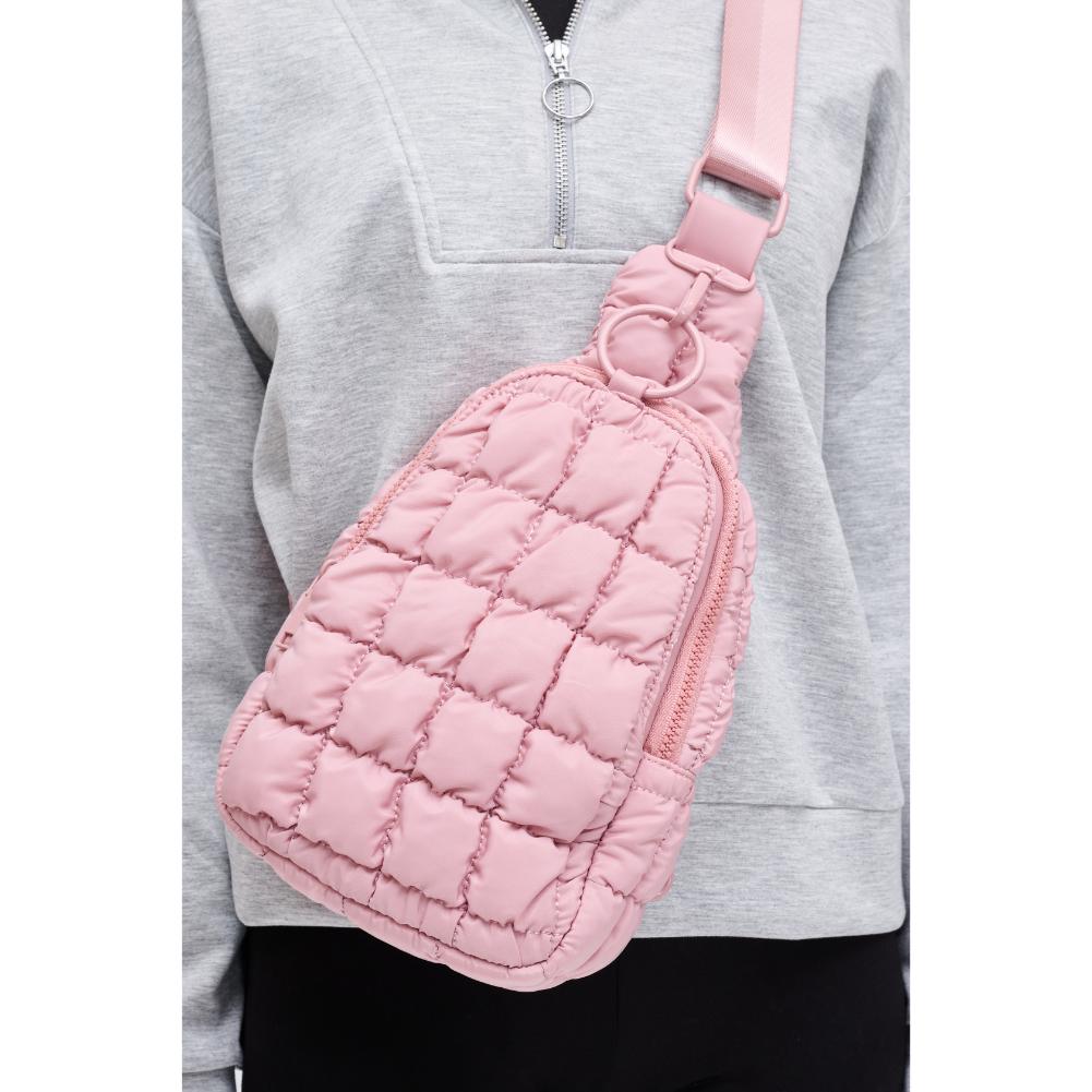 Woman wearing Rose Urban Expressions Bristol Sling Backpack 840611128355 View 4 | Rose