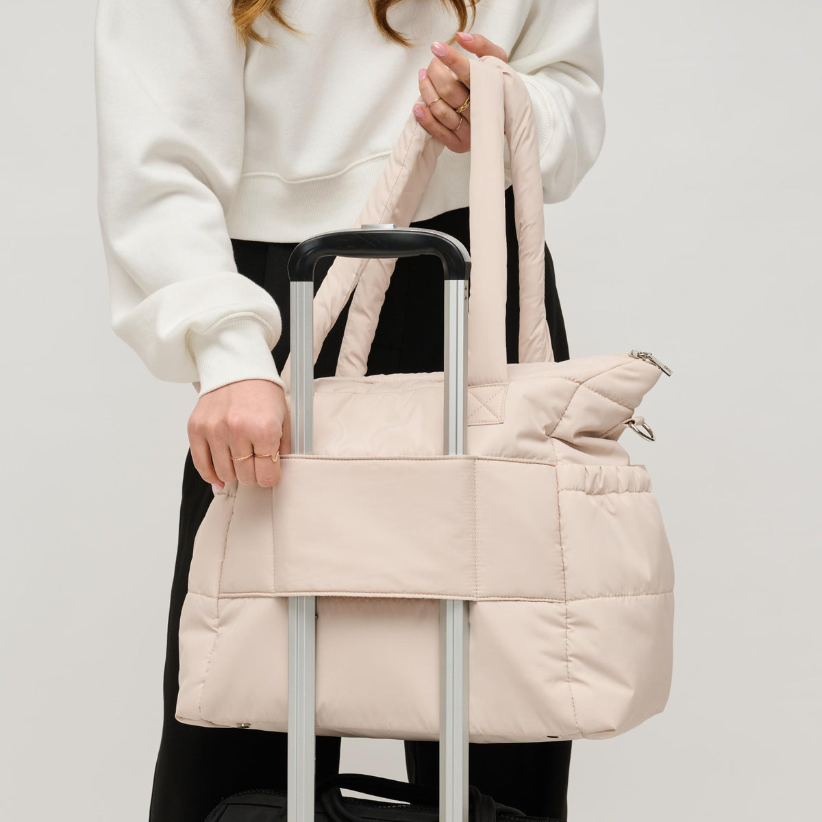 Woman wearing Cream Urban Expressions Jetsetter Tote 840611195081 View 4 | Cream