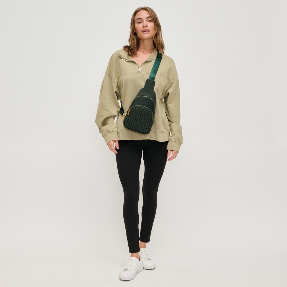 Woman wearing Olive Urban Expressions Hailey Sling Backpack 840611125521 View 3 | Olive