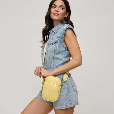 Woman wearing Butter Urban Expressions Celeste Crossbody 840611147707 View 1 | Butter