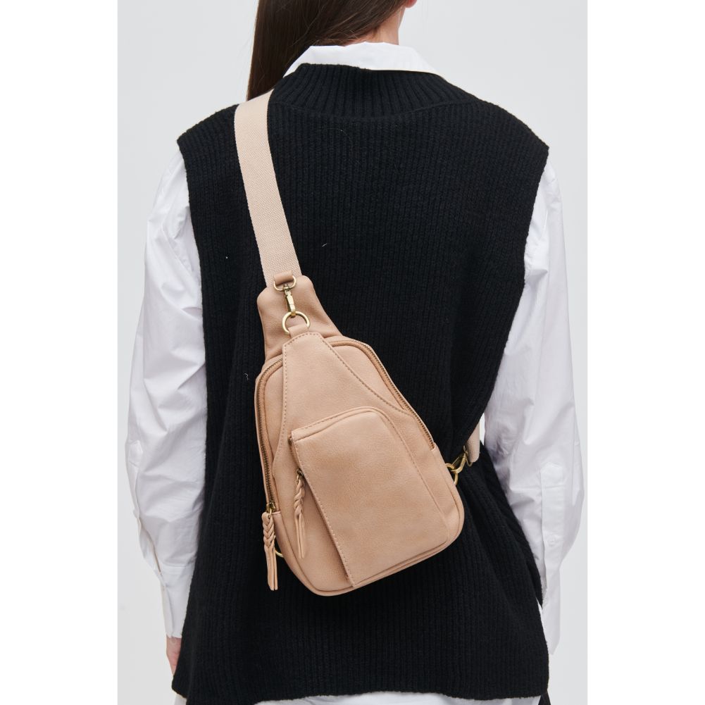 Woman wearing Natural Urban Expressions Wendall Sling Backpack 840611107213 View 1 | Natural