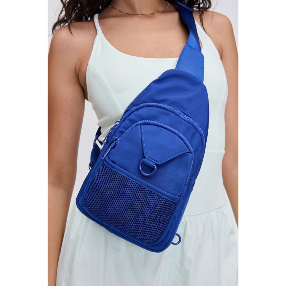 Woman wearing Royal Blue Urban Expressions Walker - Nylon Sling Backpack 840611114402 View 1 | Royal Blue