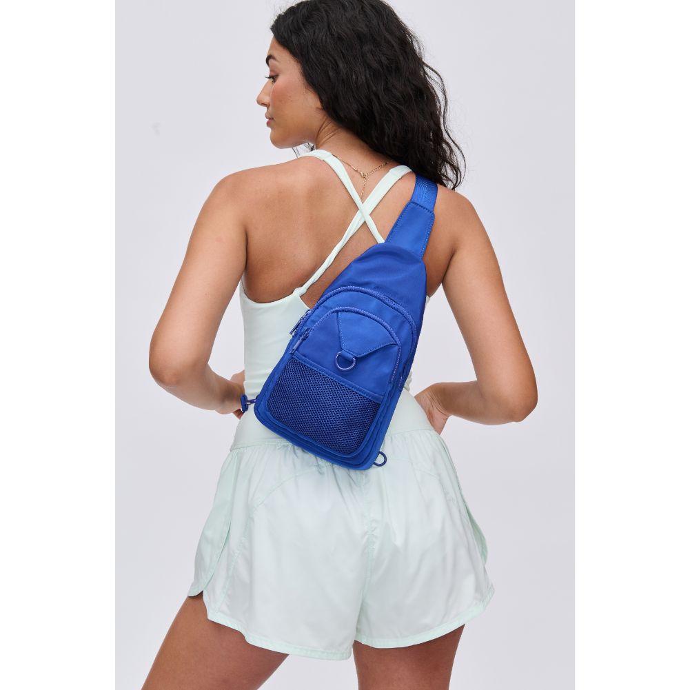 Woman wearing Royal Blue Urban Expressions Walker - Nylon Sling Backpack 840611114402 View 2 | Royal Blue