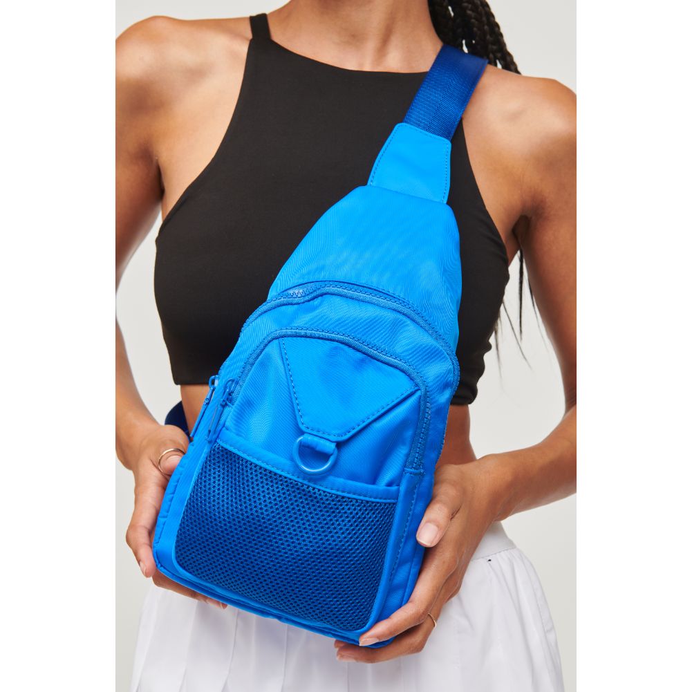 Woman wearing Blue Urban Expressions Walker - Nylon Sling Backpack 840611110954 View 4 | Blue